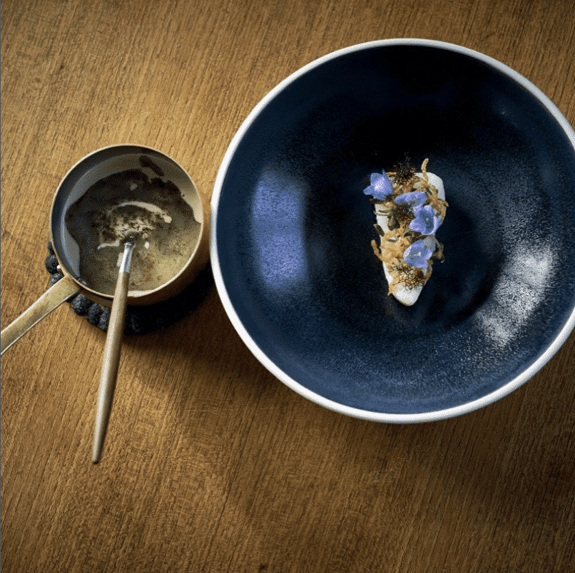 Baked cod, deep fried sourdough, cider and truffle seaweed sauce